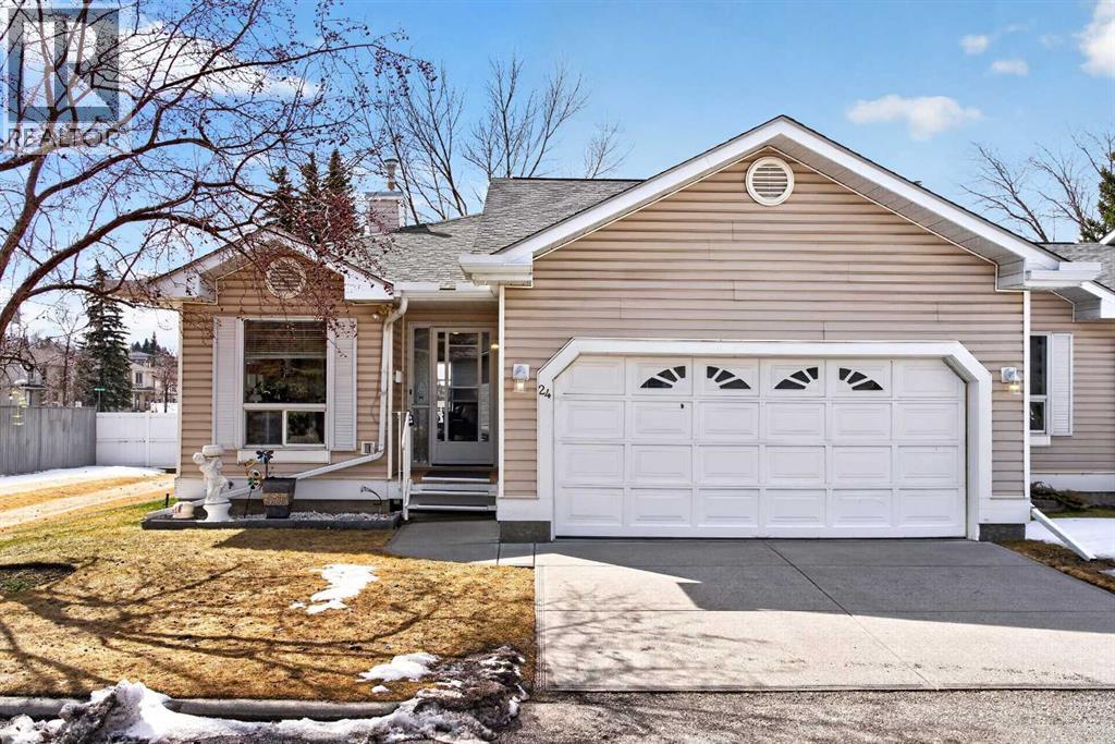 Row / Townhouse for Sale in 24 Deer Ridge Close SE|Calgary, Alberta T2J7C2