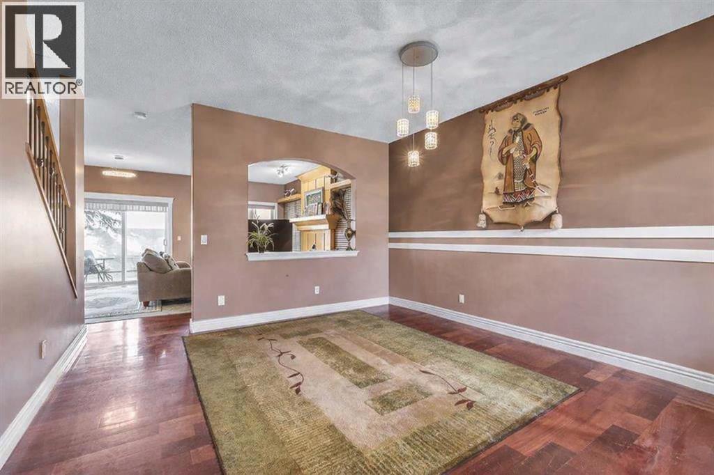 Row / Townhouse for Sale in 69, 39 Strathlea Common SW|Calgary, Alberta T3H5P8 3