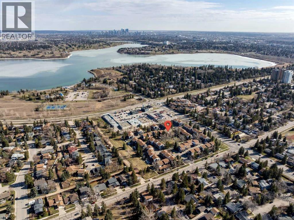 Row / Townhouse for Sale in 1002, 2520 Palliser Drive SW|Calgary, Alberta T2V4S9