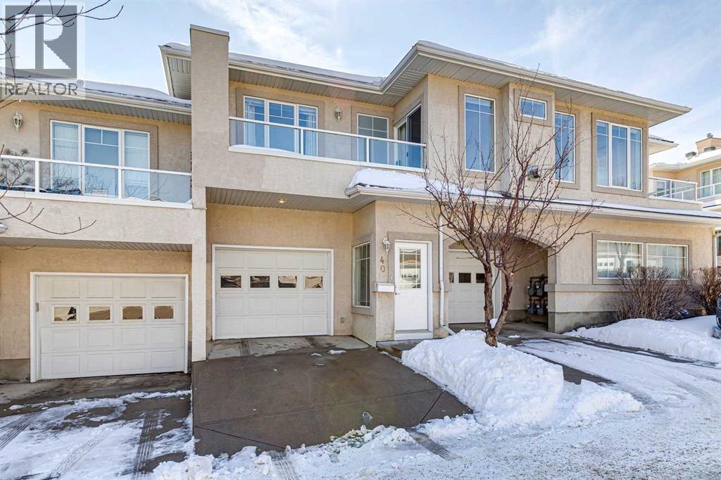 Row / Townhouse for Sale in 40 Edgeridge Terrace NW|Calgary, Alberta T3A6C2
