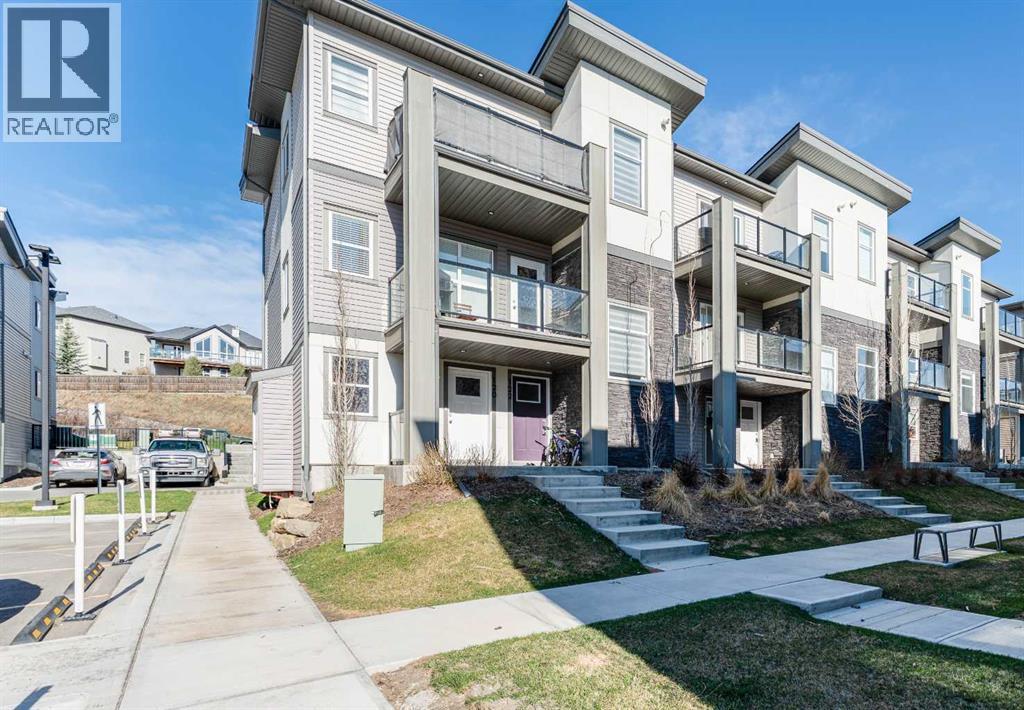 Row / Townhouse for Sale in 120 Spring Creek Common SW|Calgary, Alberta T3H6E2
