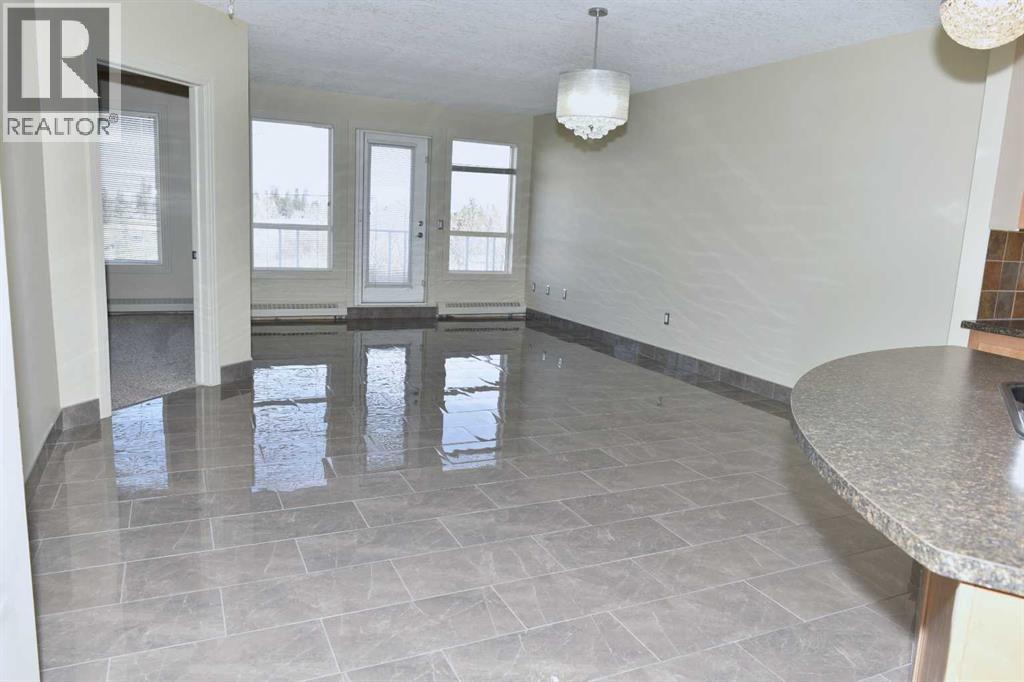 Apartment for Sale in 411, 3101 34 Avenue NW|Calgary, Alberta T2L2A3 3