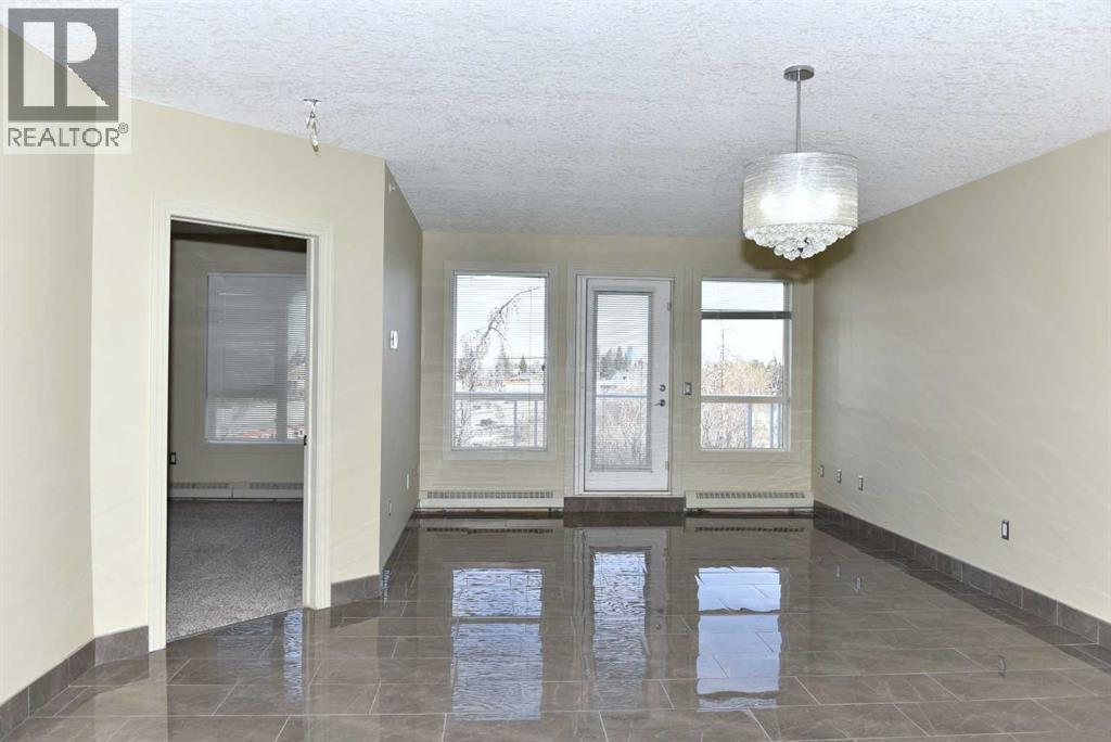 Apartment for Sale in 411, 3101 34 Avenue NW|Calgary, Alberta T2L2A3 2