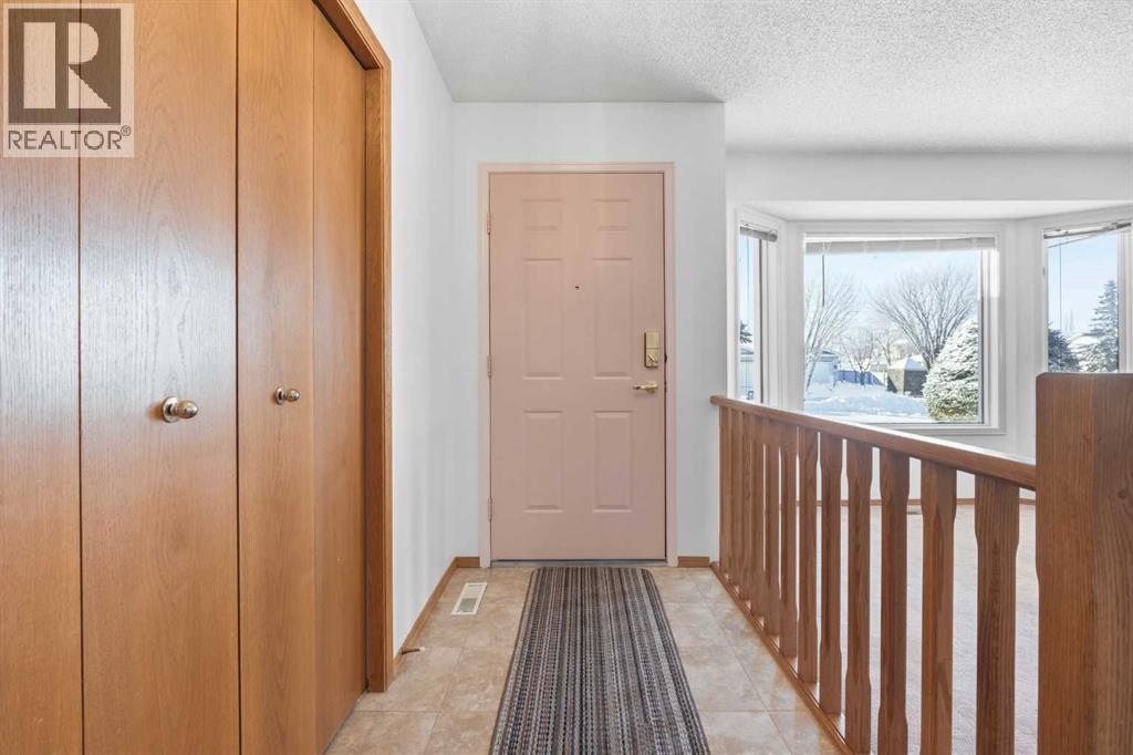 Duplex for Sale in 12 Arbour Cliff Close NW|Calgary, Alberta T3G3W8 3