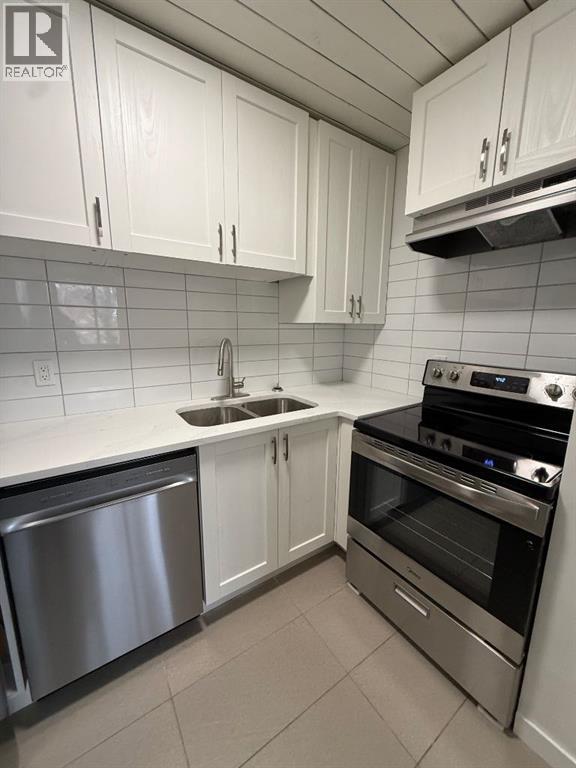 Row / Townhouse for Sale in B, 1207 44 Street SE|Calgary, Alberta T2A5E6 2