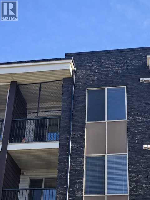 Apartment for Sale in 412, 7210 80 Avenue NE|Calgary, Alberta T3J0N7 2