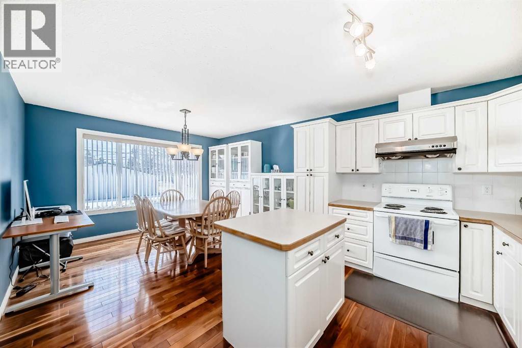 Row / Townhouse for Sale in 82 Holmwood Avenue NW|Calgary, Alberta T2K6K7 5