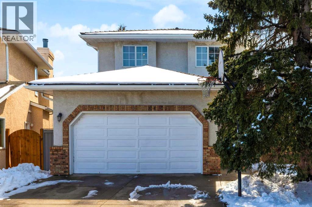 House for Sale in 220 Woodbrook Mews SW|Calgary, Alberta T2W4P8