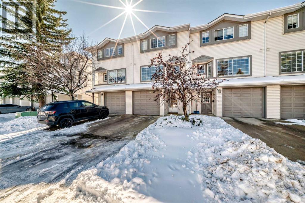 Row / Townhouse for Sale in 35 Kingsland Villas SW|Calgary, Alberta T2V5J9