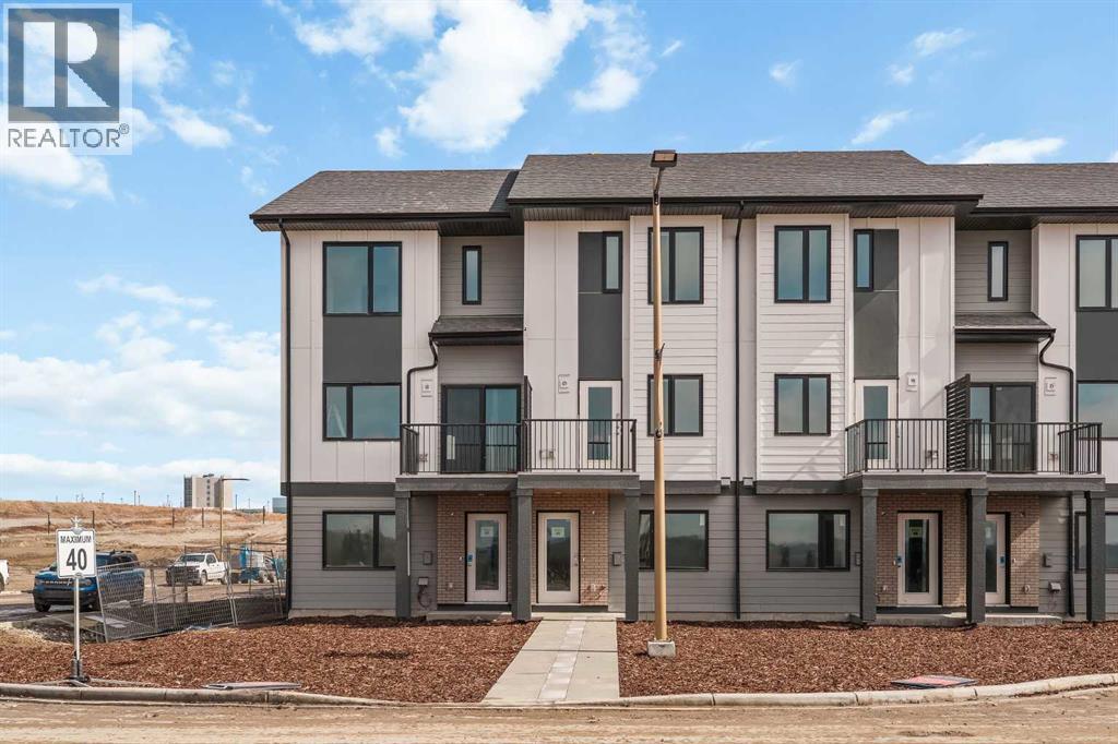 Row / Townhouse for Sale in 26 Rowmont Heath NW|Calgary, Alberta T3L0M2