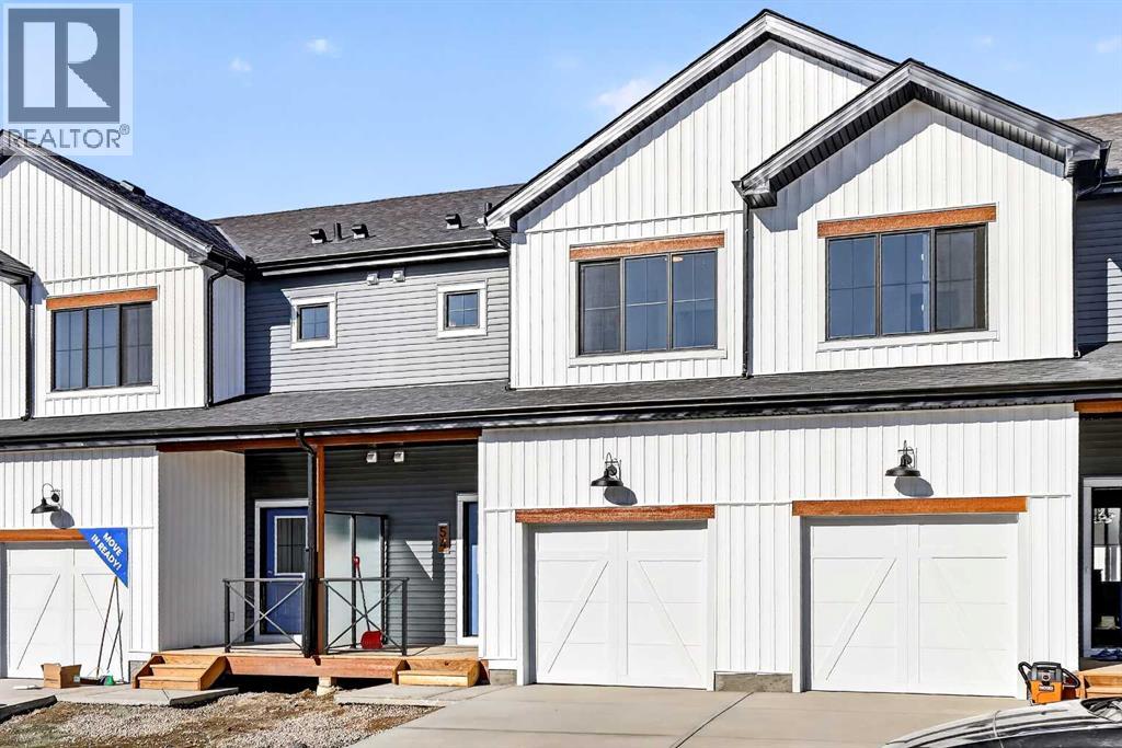 Row / Townhouse for Sale in 54 Creekside Way SW|Calgary, Alberta T2X6E2
