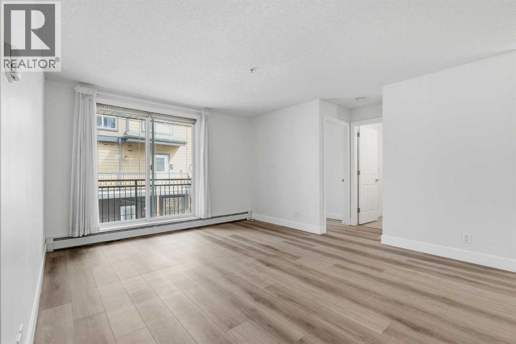 Apartment for Sale in 203, 2440 34 Avenue SW|Calgary, Alberta t2t2c8 3