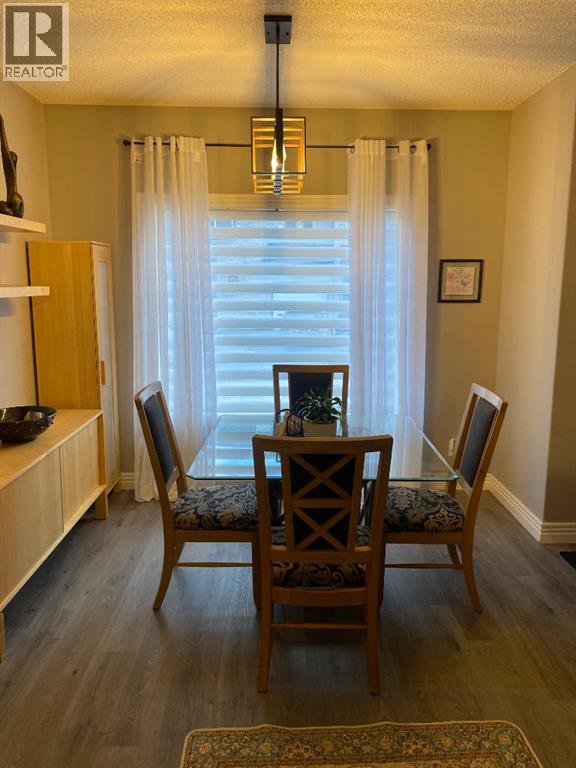 Row / Townhouse for Sale in 131 Bridlewood View SW|Calgary, Alberta T2Z3Y1 4