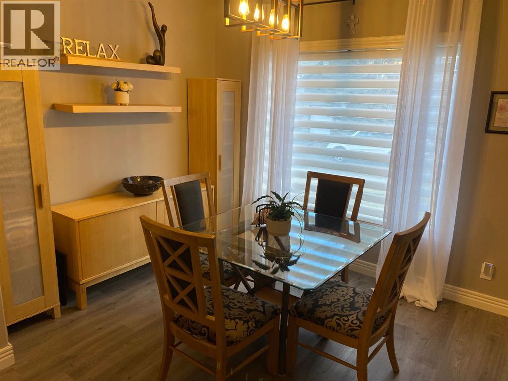 Row / Townhouse for Sale in 131 Bridlewood View SW|Calgary, Alberta T2Z3Y1 5