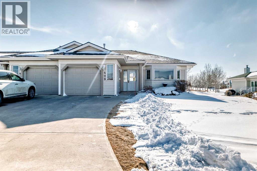 Duplex for Sale in 409 Hope Bay|Rural Rocky View County, Alberta T1X1G5