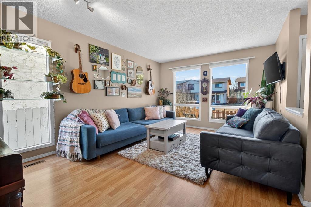 Row / Townhouse for Sale in 161 Midbend Place SE|Calgary, Alberta T2X2K1 2