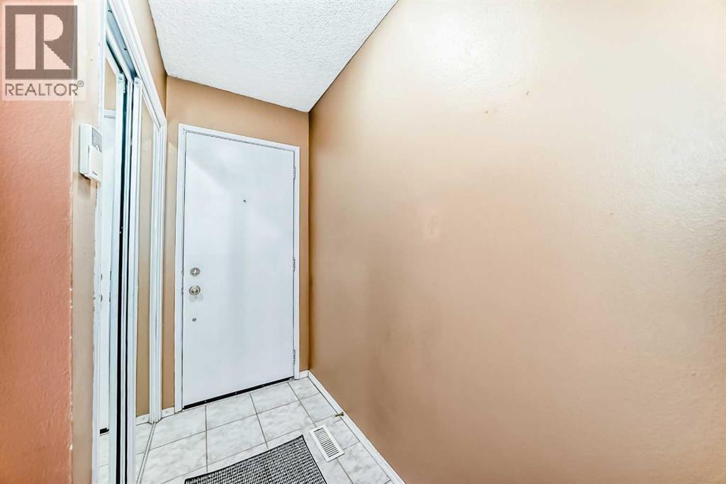 Row / Townhouse for Sale in 98, 123 Queensland Drive SE|Calgary, Alberta T2J5J4 3