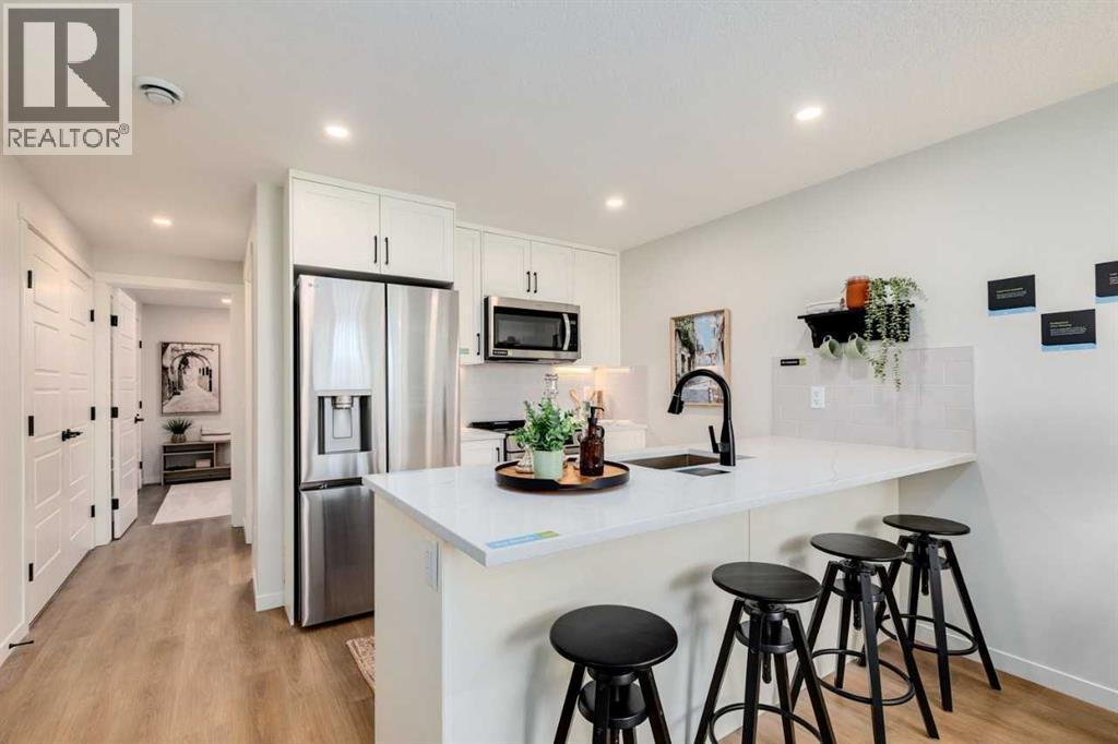 Row / Townhouse for Sale in 111, 155 Crimson Ridge Place NW|Calgary, Alberta T3L2M4 2
