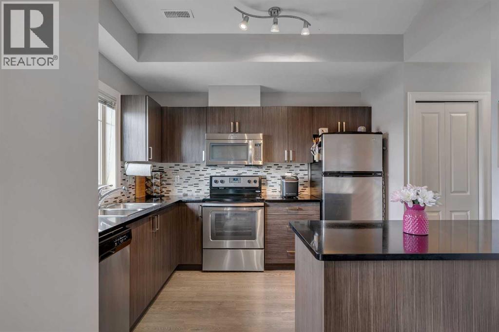Row / Townhouse for Sale in 414, 121 Copperpond Common SE|Calgary, Alberta T2Z5B6 2