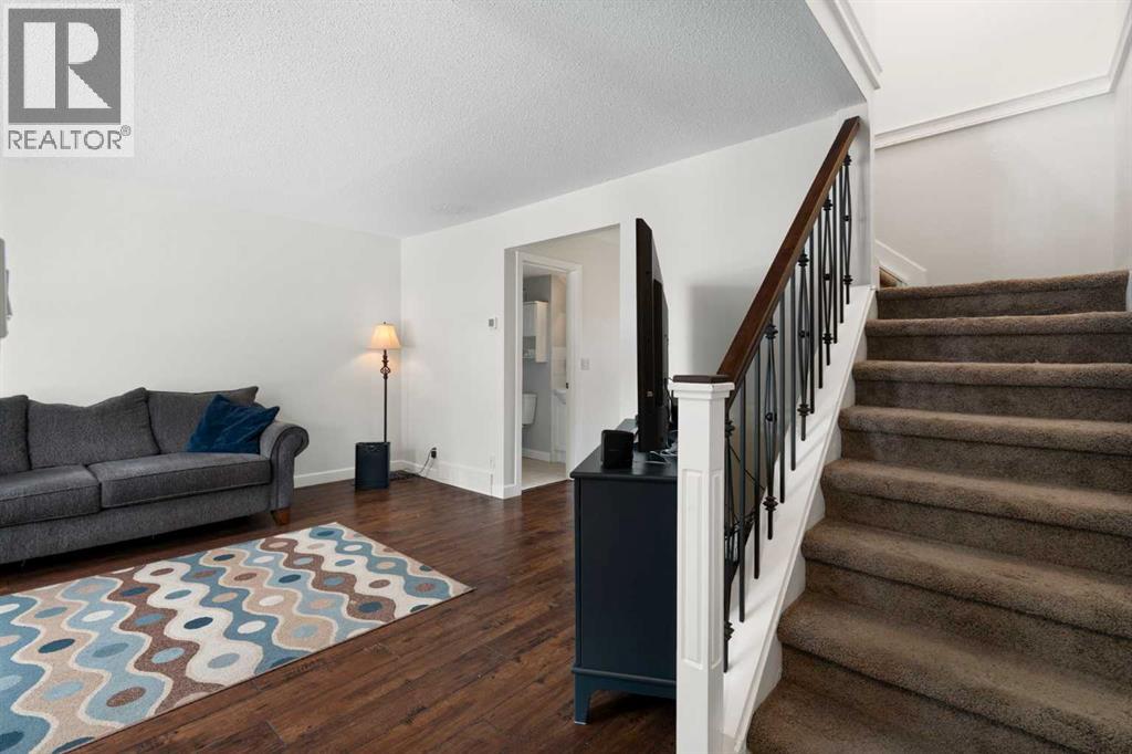 Row / Townhouse for Sale in 144, 123 Queensland Drive SE|Calgary, Alberta T2J5J4 3