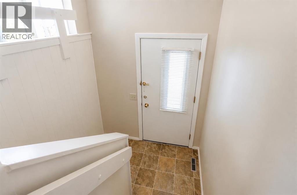 Duplex for Sale in 92 Queen Isabella Close SE|Calgary, Alberta T2J3R1 3