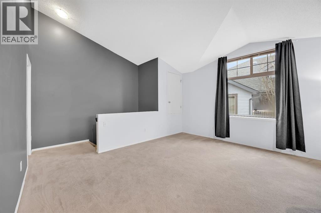 Row / Townhouse for Sale in 205, 27 Everridge Square SW|Calgary, Alberta T2Y5J7 3