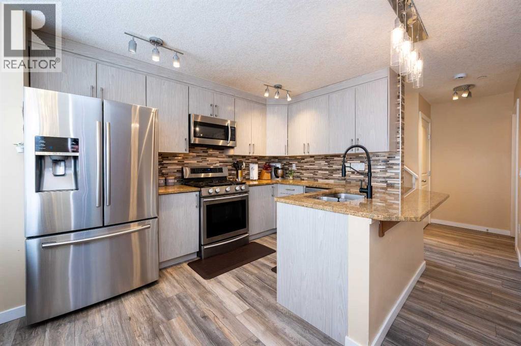 House for Sale in 60 Covecreek Mews NE|Calgary, Alberta T3K0J6 2