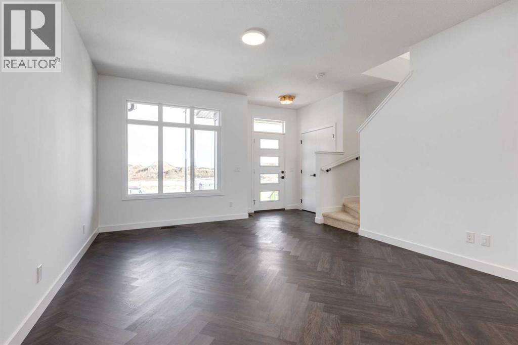 Row / Townhouse for Sale in 7126 Rangeview Avenue SE|Calgary, Alberta T3S0S7 2