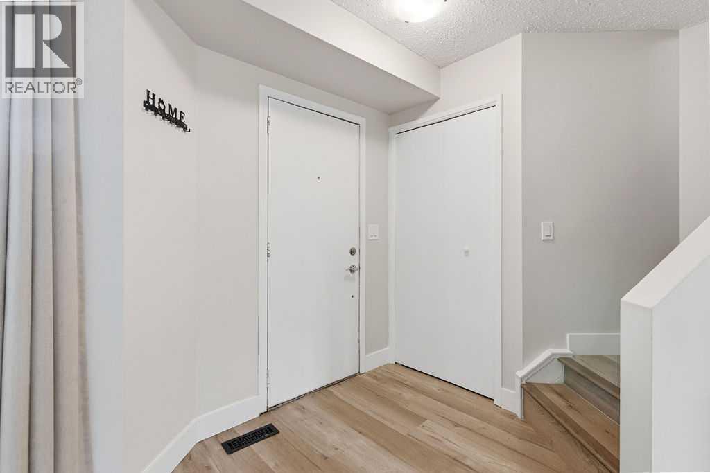 Row / Townhouse for Sale in 102, 123 Queensland Drive SE|Calgary, Alberta T2J5J4 3