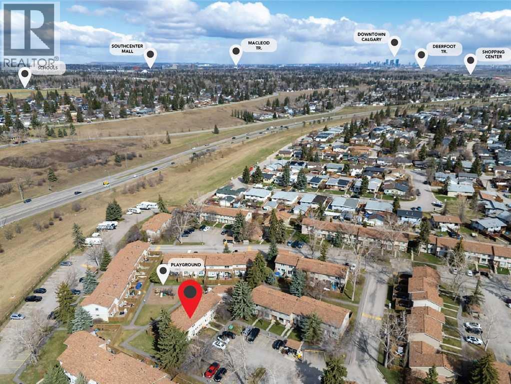 Row / Townhouse for Sale in 102, 123 Queensland Drive SE|Calgary, Alberta T2J5J4