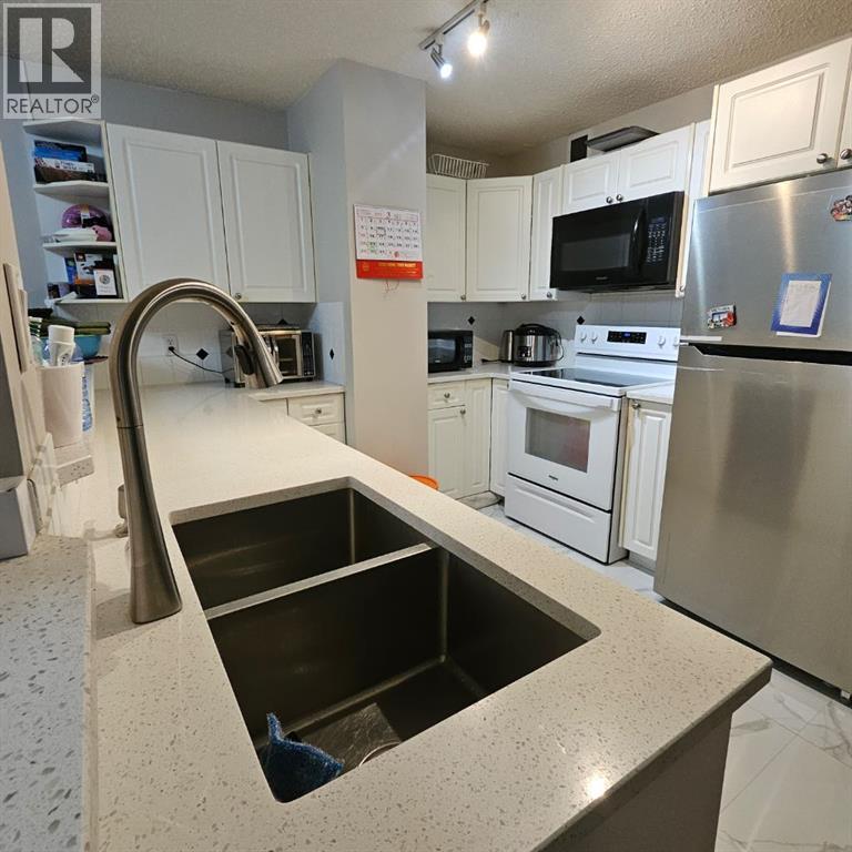 Apartment for Sale in 203, 511 56 Avenue SW|Calgary, Alberta T2V0G6 4