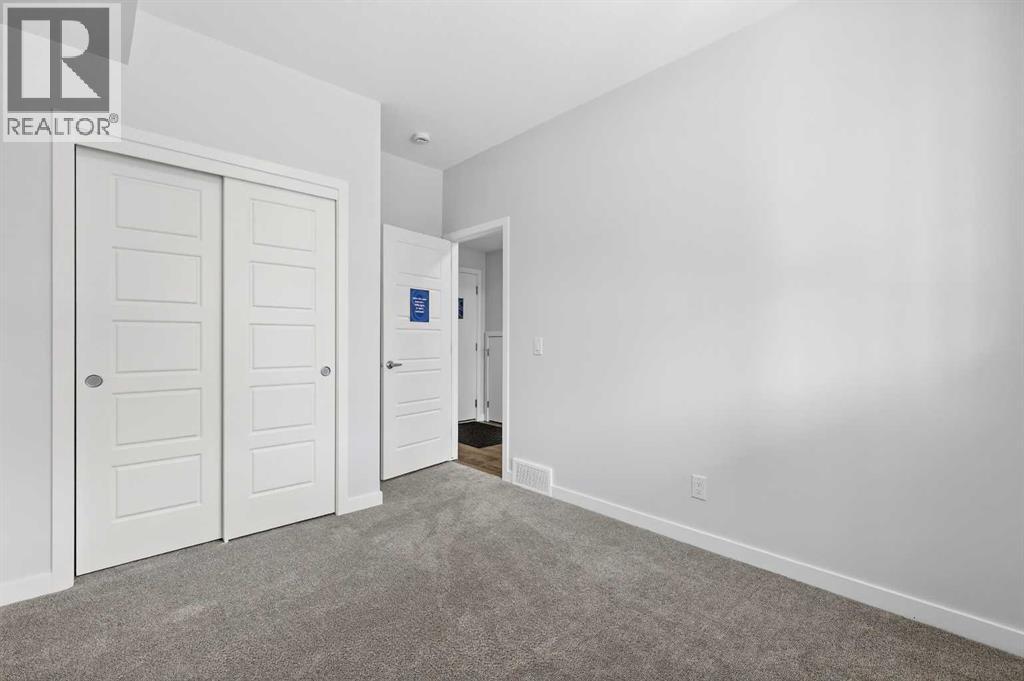 Row / Townhouse for Sale in 121, 1750 Rangeview Drive SE|Calgary, Alberta T3S0X3 4
