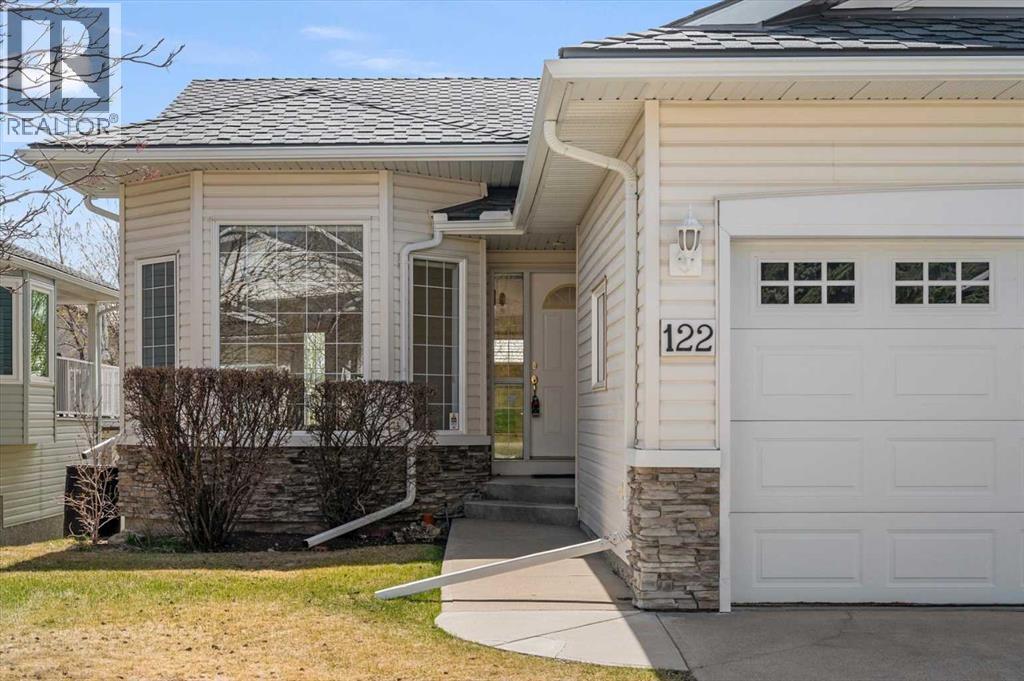 Duplex for Sale in 122 Rocky Ridge Villas NW|Calgary, Alberta T3G4R3 2