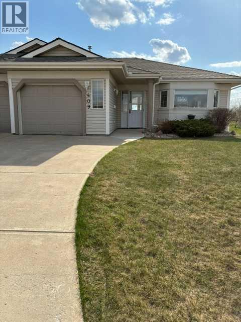 Duplex for Sale in 409 Hope Bay|Rural Rocky View County, Alberta T1X1G5
