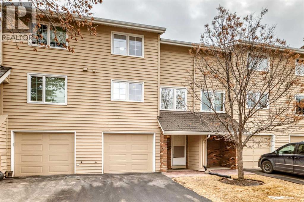 Row / Townhouse for Sale in 322 Point Mckay Gardens NW|Calgary, Alberta T3B5B7