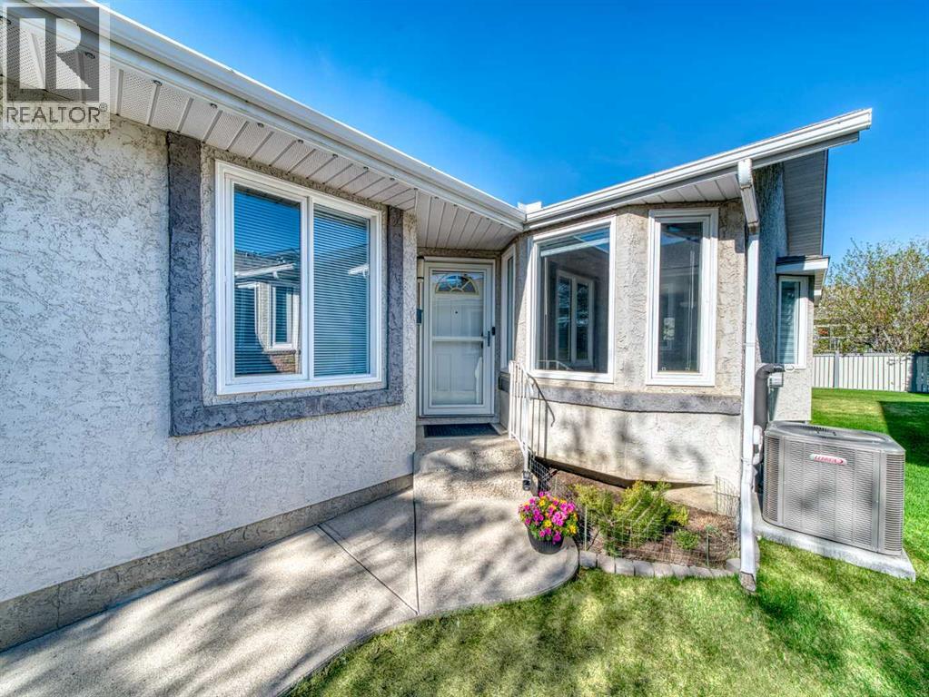 Duplex for Sale in 301 Arbour Cliff Close NW|Calgary, Alberta T3G3W8 2