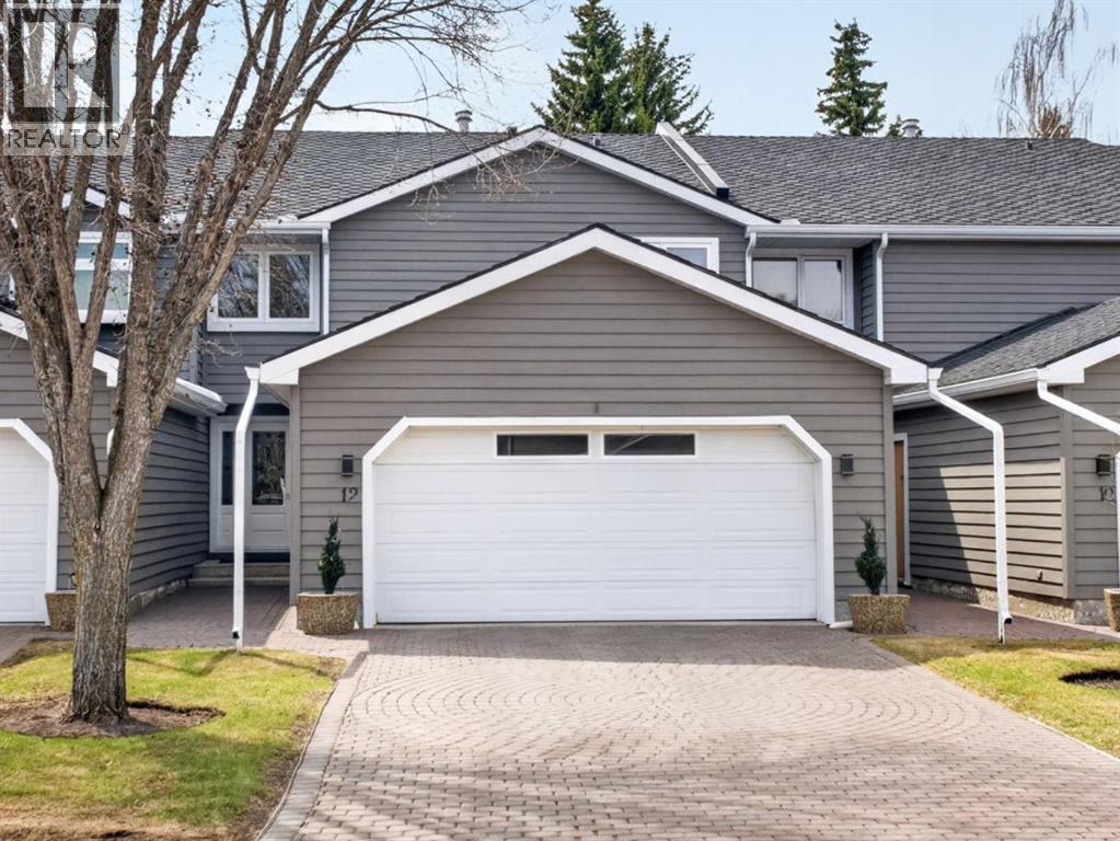 Row / Townhouse for Sale in 12 Wood Crescent SW|Calgary, Alberta T2W4B4 2