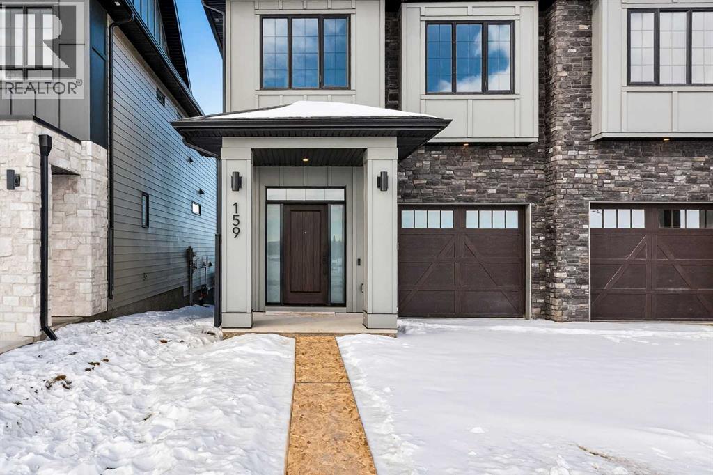 Duplex for Sale in 159 Greenwich Drive NW|Calgary, Alberta T3B6N9 2