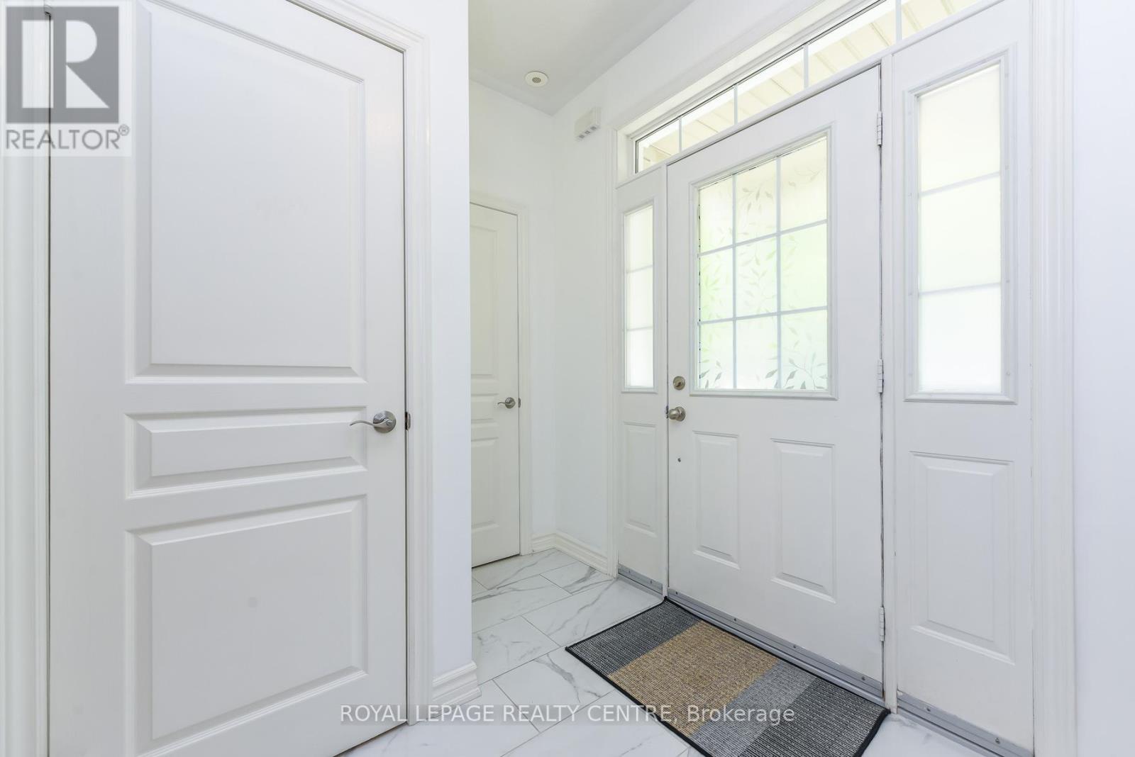Row / Townhouse for Sale in 210 - 60 ROSEWOOD AVENUE|Mississauga (Port Credit), Ontario L5G4W2 3