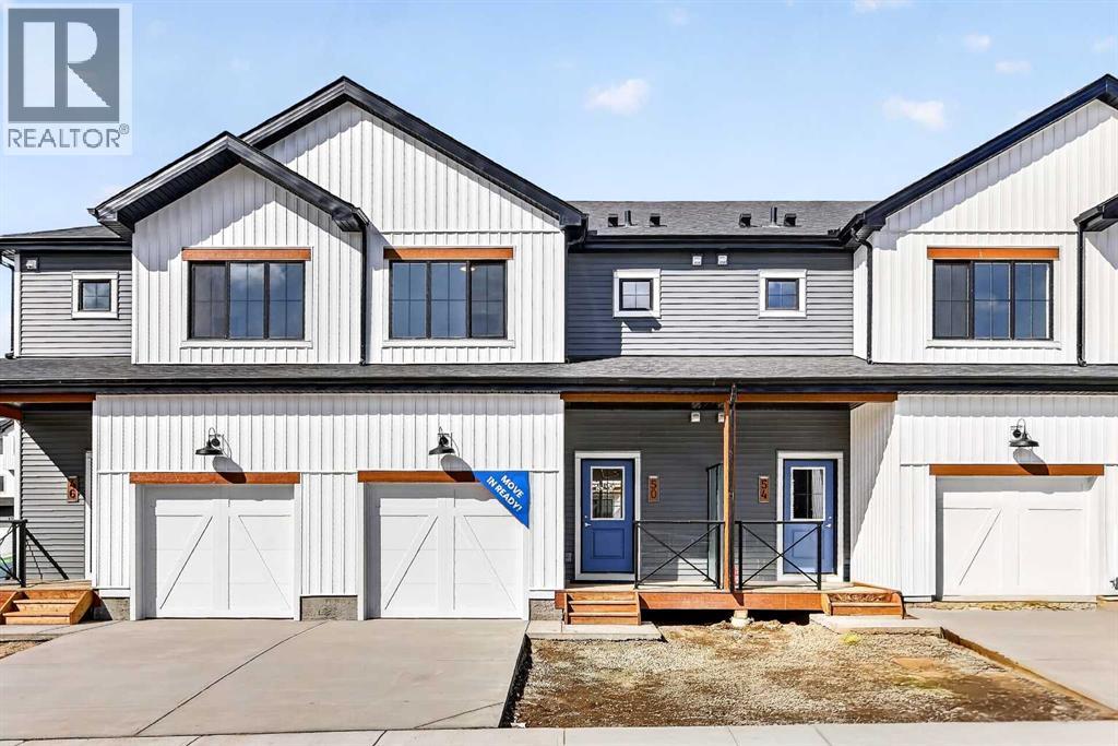 Row / Townhouse for Sale in 50 Creekside Way SW|Calgary, Alberta T2X6E2
