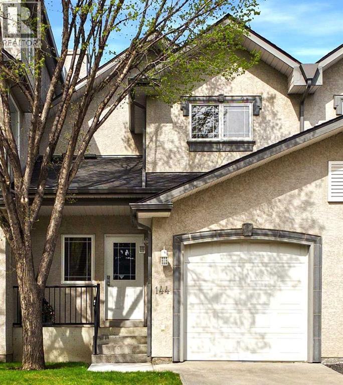 Row / Townhouse for Sale in 144 Simcoe Place SW|Calgary, Alberta T3H4T7 2