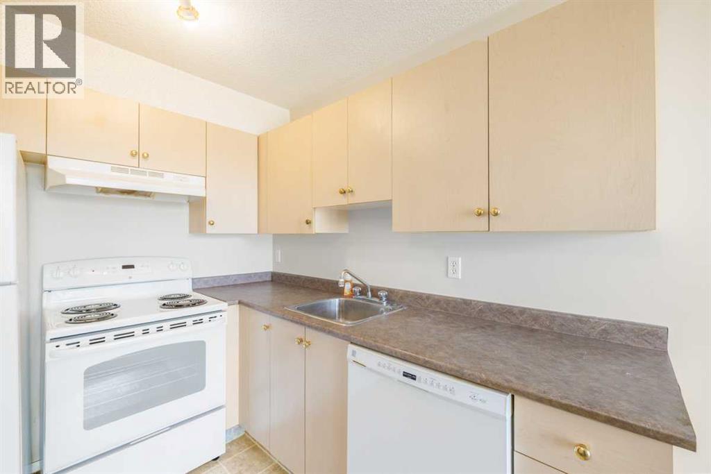 Apartment for Sale in 113, 1717 60 Street SE|Calgary, Alberta T2A7Y7 3