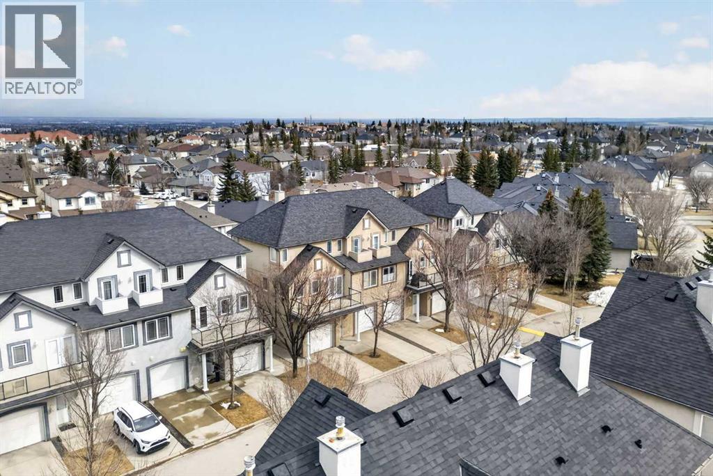 Row / Townhouse for Sale in 34 Simcoe Place SW|Calgary, Alberta T3H4T8 2