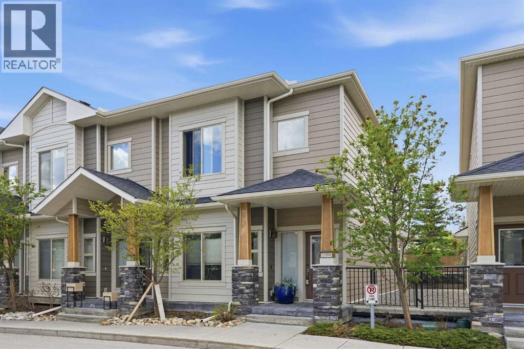 Row / Townhouse for Sale in 86 Cougar Ridge Landing SW|Calgary, Alberta T3H0X8