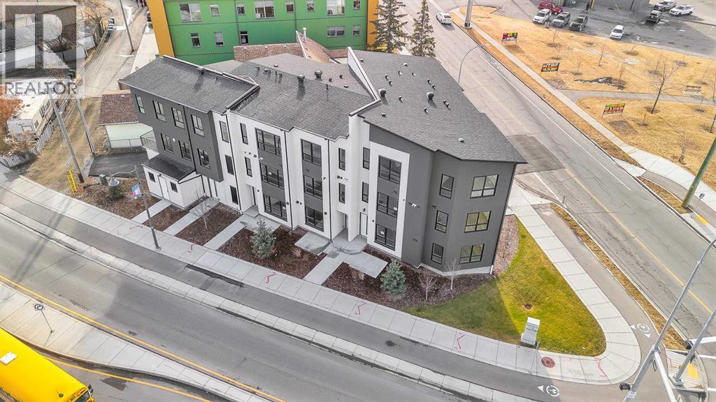 Row / Townhouse for Sale in 4907 Bowness Road NW|Calgary, Alberta T3B1H1 2