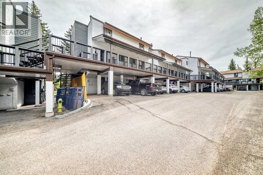 Row / Townhouse for Sale in 409, 2520 Palliser Drive SW|Calgary, Alberta T2V4S9