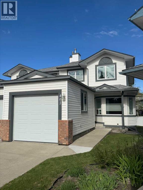 Row / Townhouse for Sale in 402 Citadel Heights NW|Calgary, Alberta T3G4A1