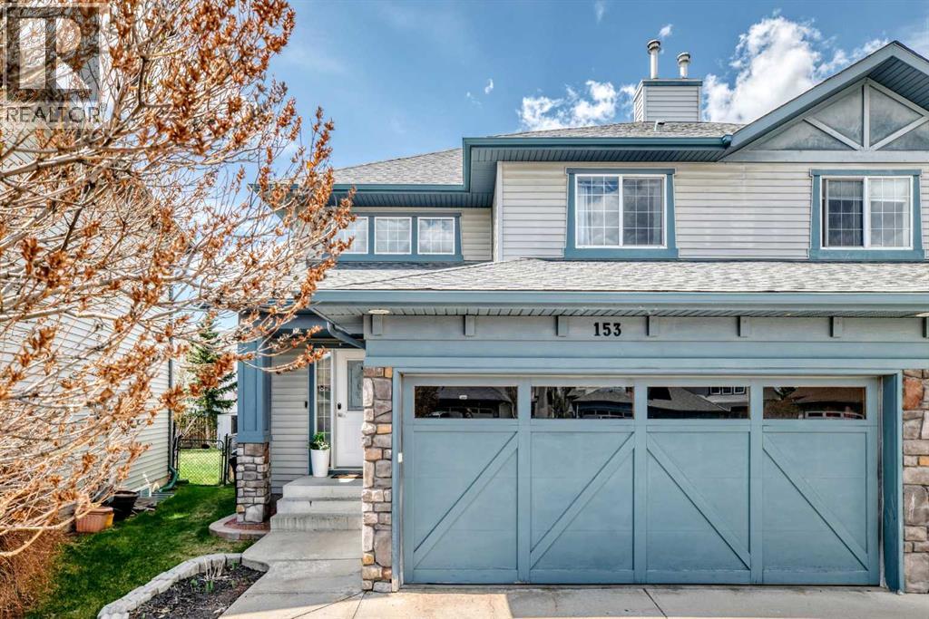 Duplex for Sale in 153 Cougarstone Place SW|Calgary, Alberta T3H4W8