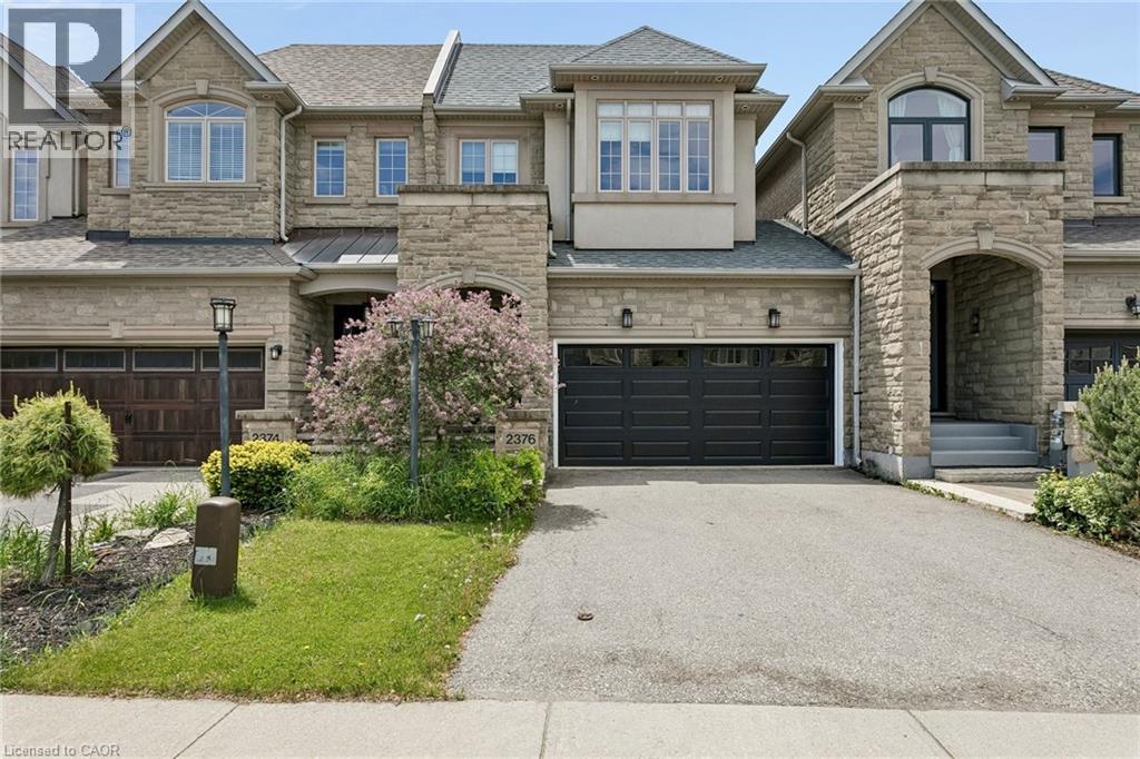 Row / Townhouse for Sale in 2376 WASAGA Drive|Oakville, Ontario L6H0B7