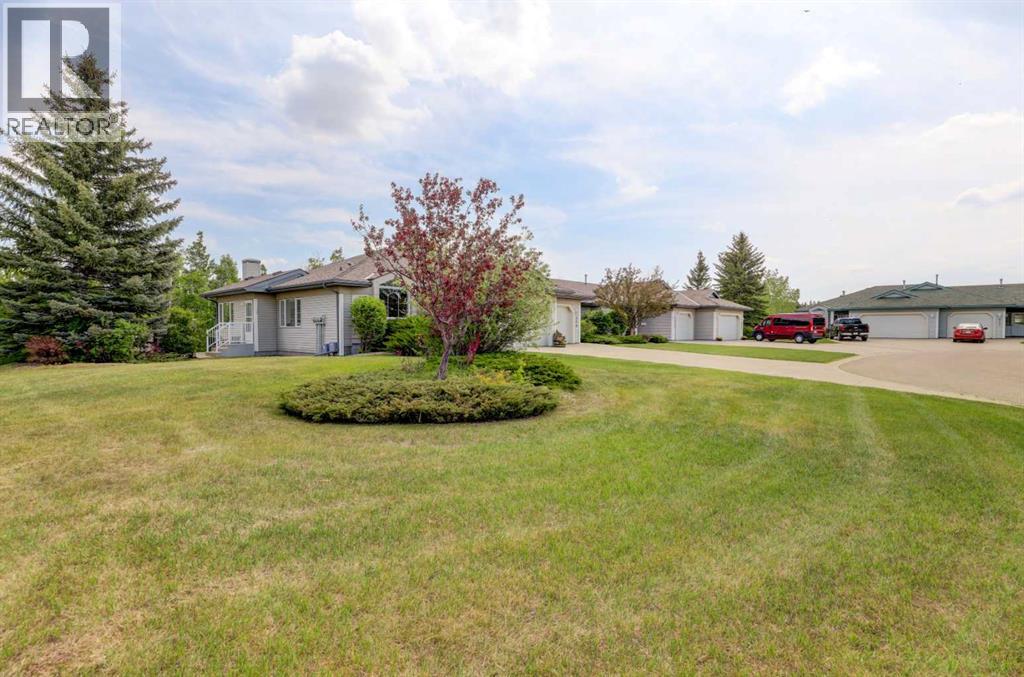 Row / Townhouse for Sale in 331 Triune Bay|Rural Rocky View County, Alberta T1X1G4 2